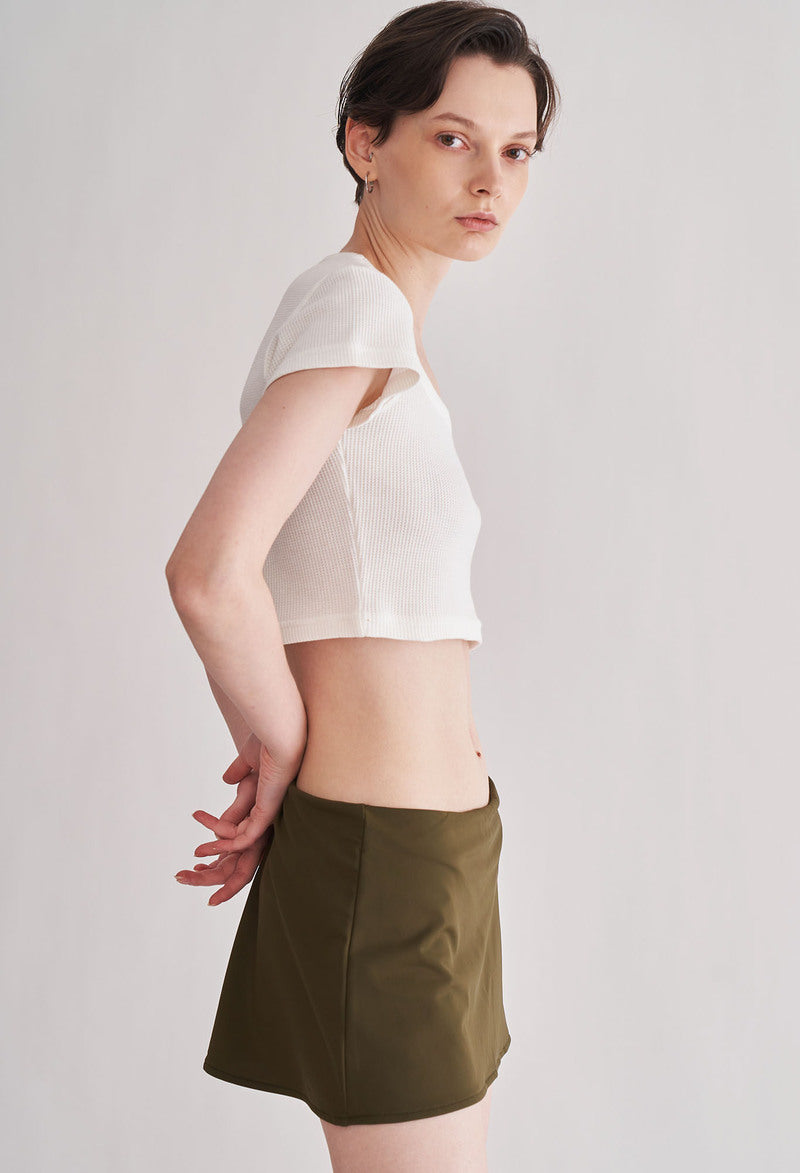 HUMAN HAUS LOW-RISE MINI SKIRT