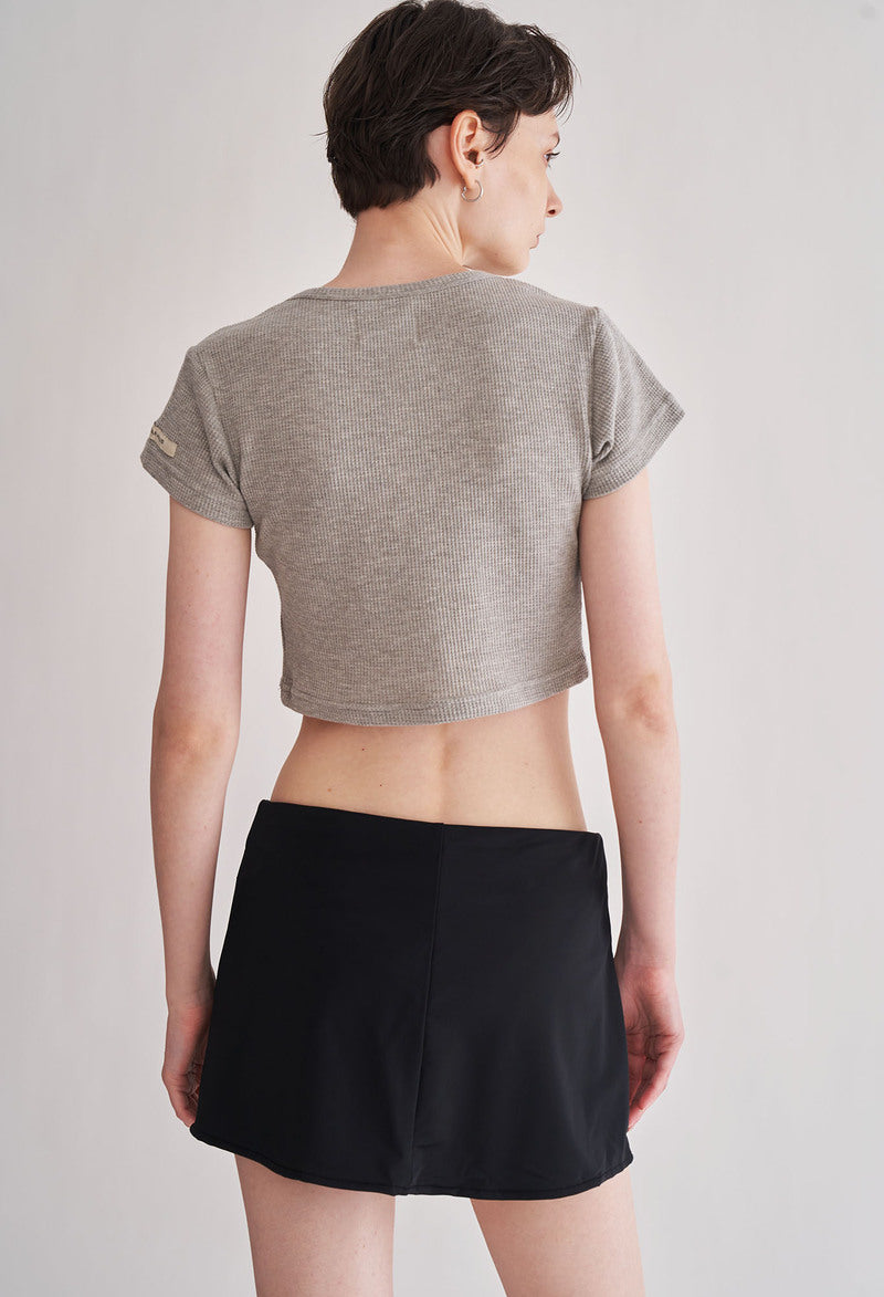 HUMAN HAUS LOW-RISE MINI SKIRT